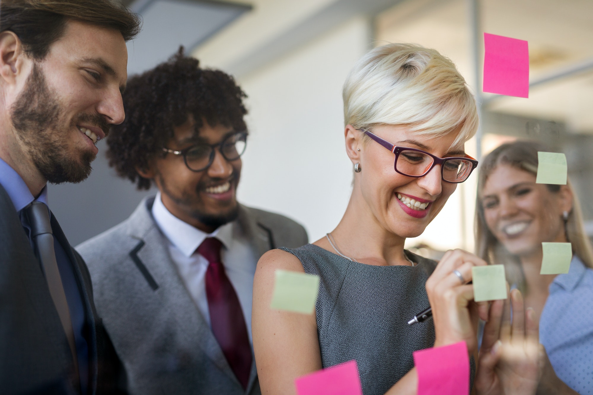 Portrait of successful business people working together in office